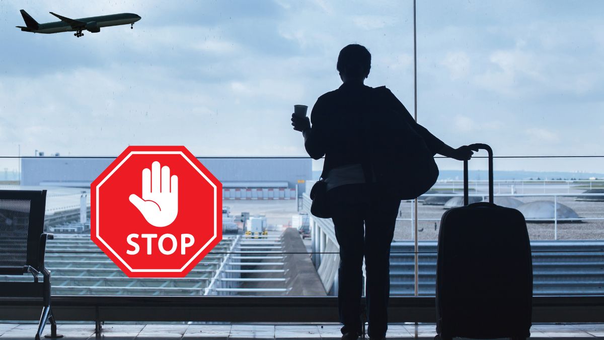 błąd systemu eVisa Foto: kobieta na lotnisku, znak stop